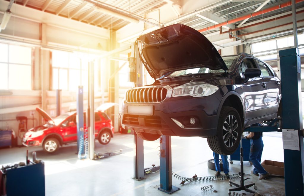 Modern car repair station with a large number of lifts and specialized equipment for diagnostics and service repair car